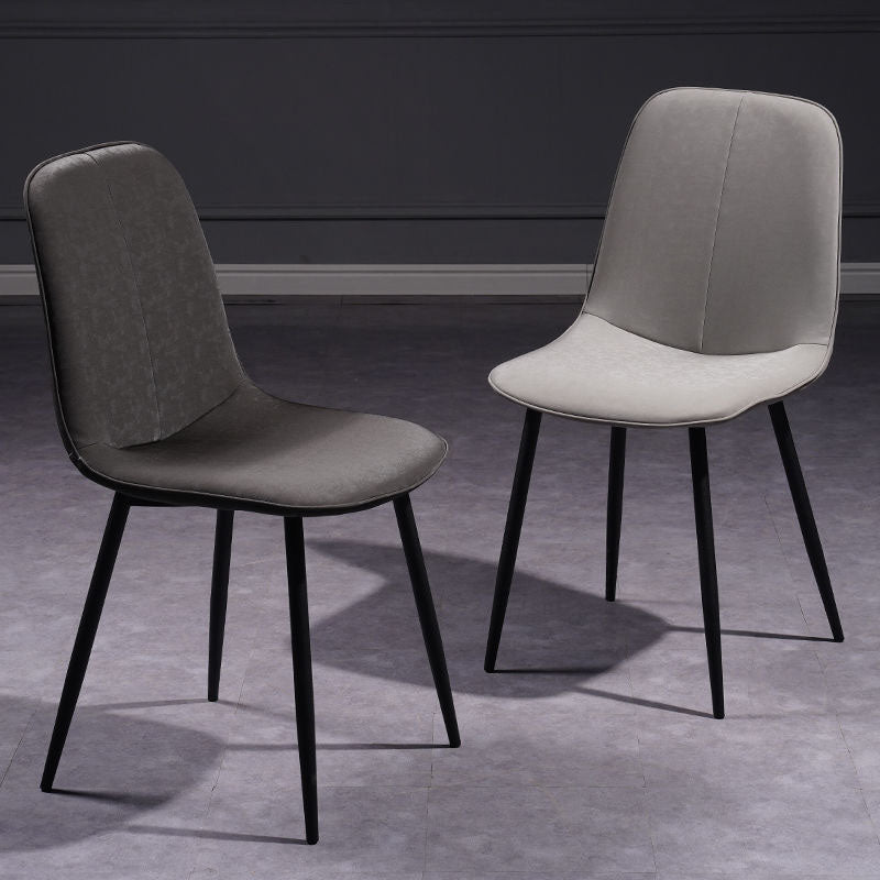 Modern gray upholstered felix ii dining chair with sleek black metal legs perfect for any dining space