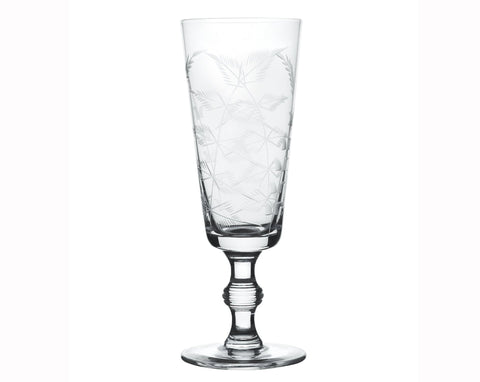 A Set of Four Crystal Champagne Flutes with Fern Design