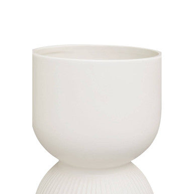 Fia white planter represented by a white ceramic candle holder with smooth rounded design and sleek finish