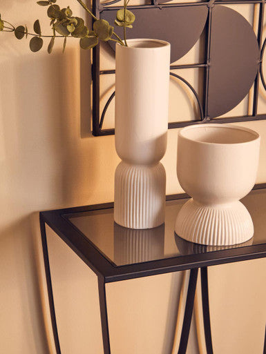 Cream-colored ceramic fia white planter with ribbed texture and modern geometric shapes for stylish indoor decor