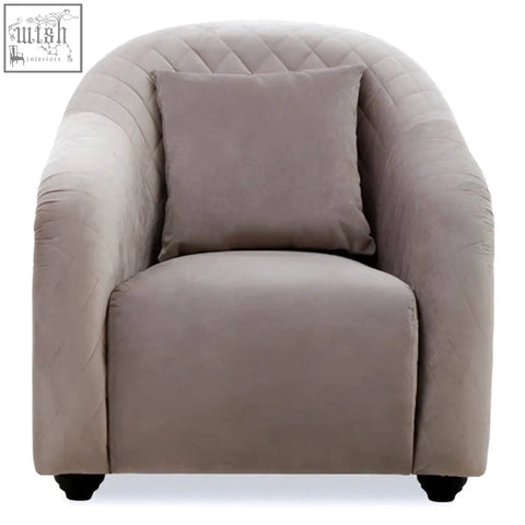 Beige quilted velvet fifi grey chair with matching cushion and black feet perfect for stylish seating