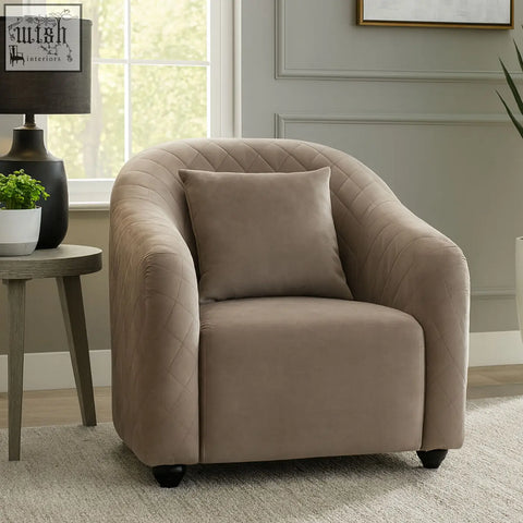 Beige quilted velvet armchair with matching cushion showcasing the fifi grey velvet chair style and comfort