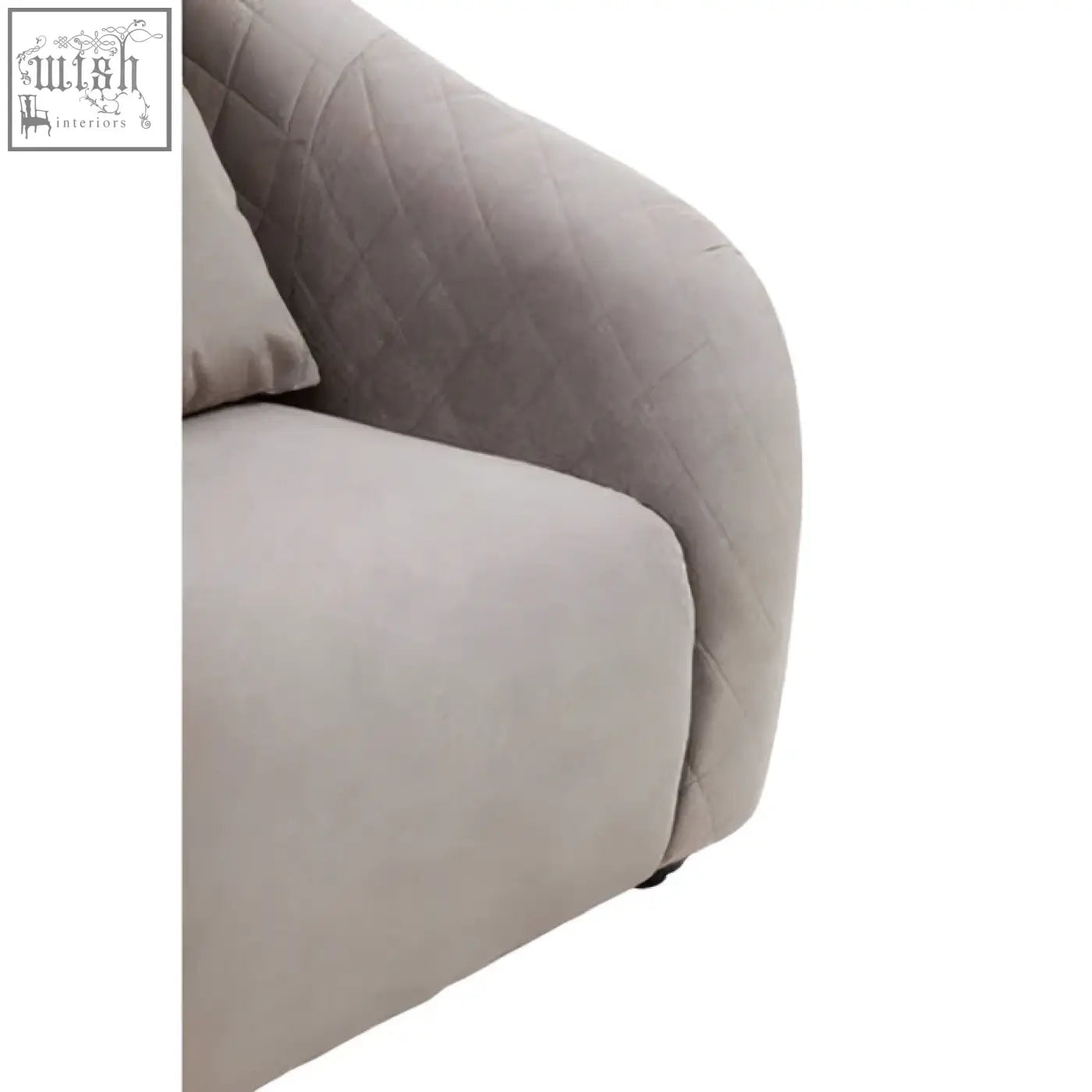 Fifi grey velvet chair is a grey velvet chair with a soft plush texture and rounded contours perfect for cozy seating