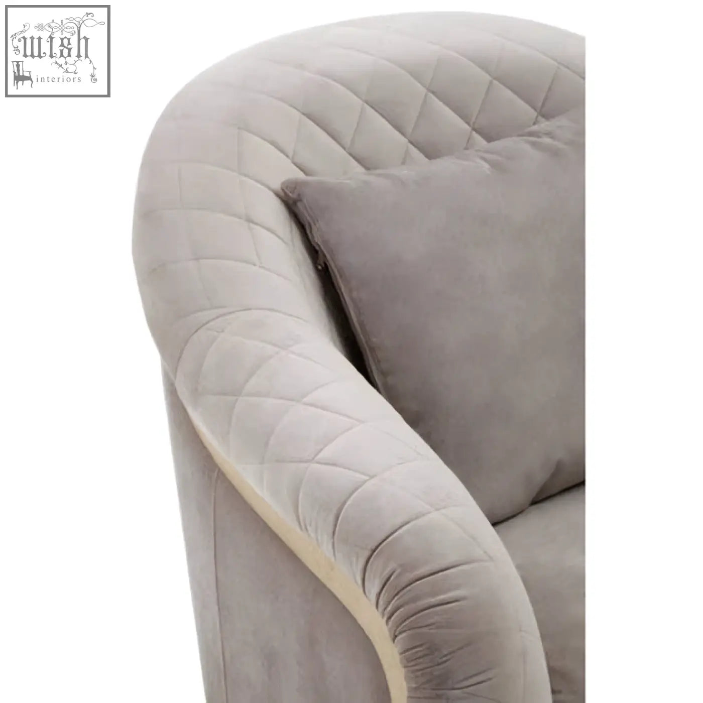 A plush grey velvet chair with quilted diamond pattern and curved design called fifi grey velvet armchair