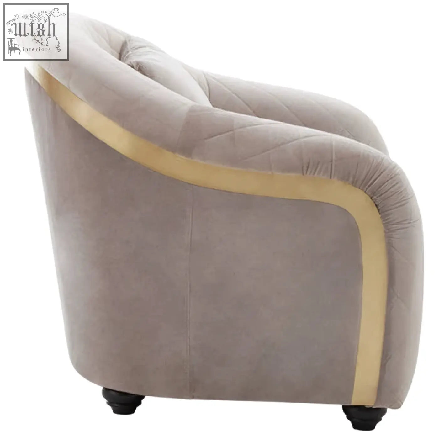 Fifi grey velvet chair featuring a plush light grey velvet armchair with gold piping and dark wooden legs