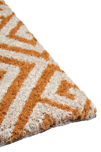 Filta coir geometric design doormat with textured orange and beige pattern and frayed edges for outdoor use