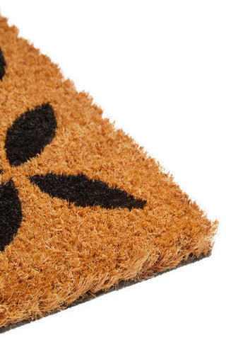 Brown coir Filta Flower doormat with black leaf pattern perfect for outdoor entryway use