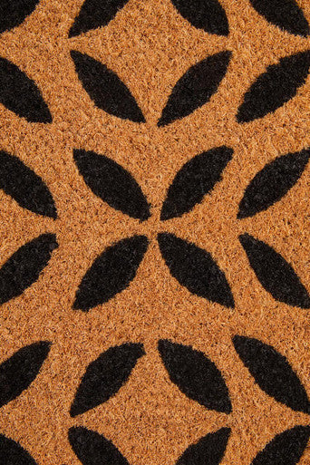 Brown coir doormat with black leaf pattern from filta flower perfect for outdoor entryways and homes
