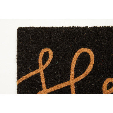Black coir doormat with tan cursive lettering perfect for welcoming guests at your doorstep