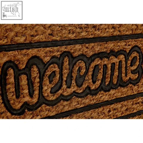 Brown coir panama doormat with black stitched lettering and skid pvc backing for secure outdoor use