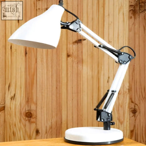 White adjustable desk lamp finley with sleek articulated arm and black joints for versatile lighting control
