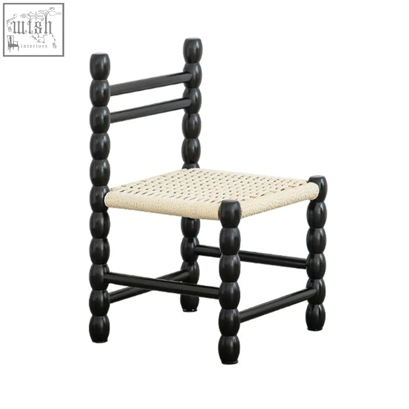 Black wooden fiona dining chair with woven beige rattan seat and bead-like turned legs for stylish dining use