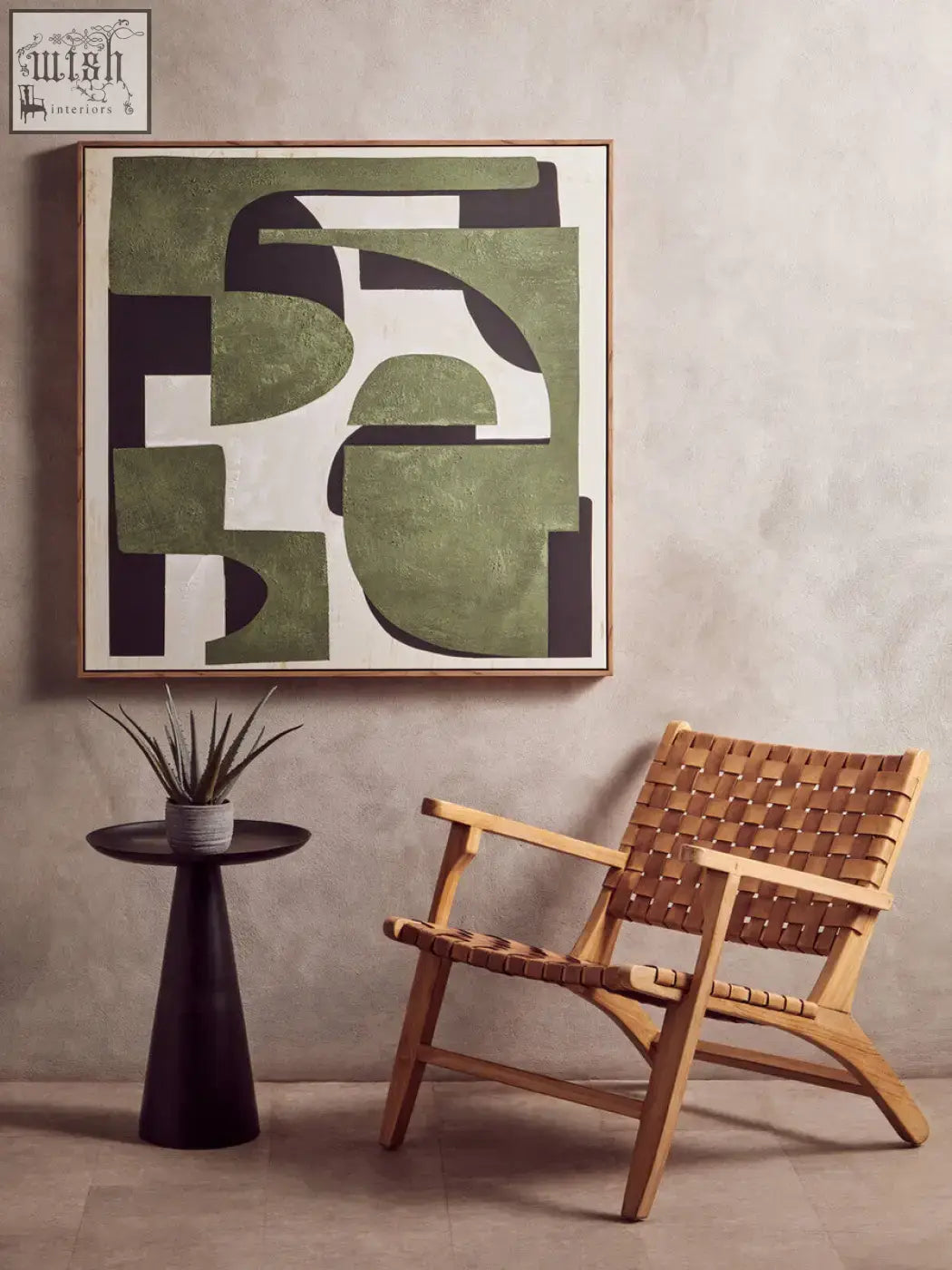 A woven wooden armchair with a natural finish and interlaced seat beside a fiori small succulent with natural stone base