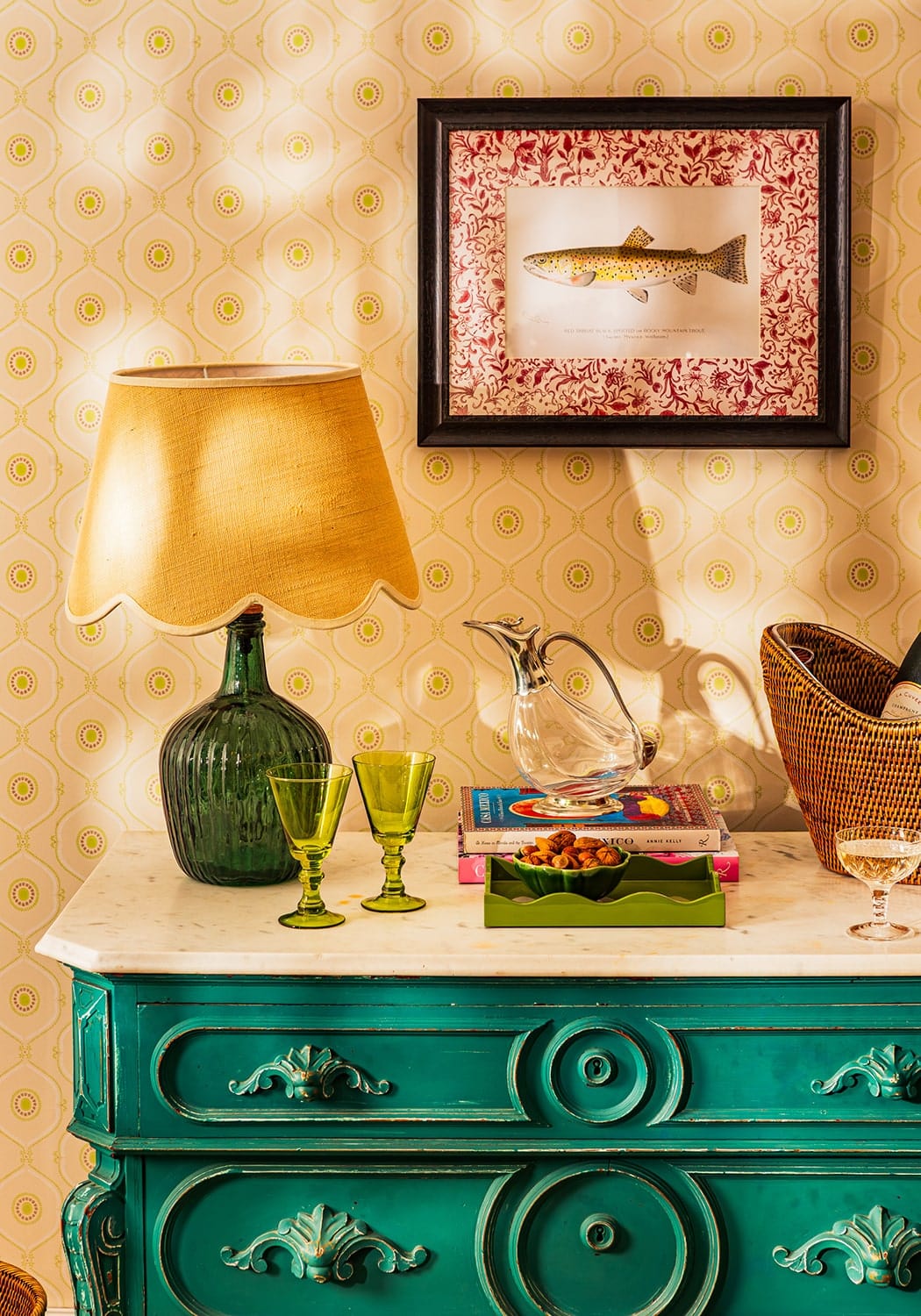 A teal-green vintage-style dresser with ornate carved handles and circular motifs featured in fish ii framed print a quiet classic with personality