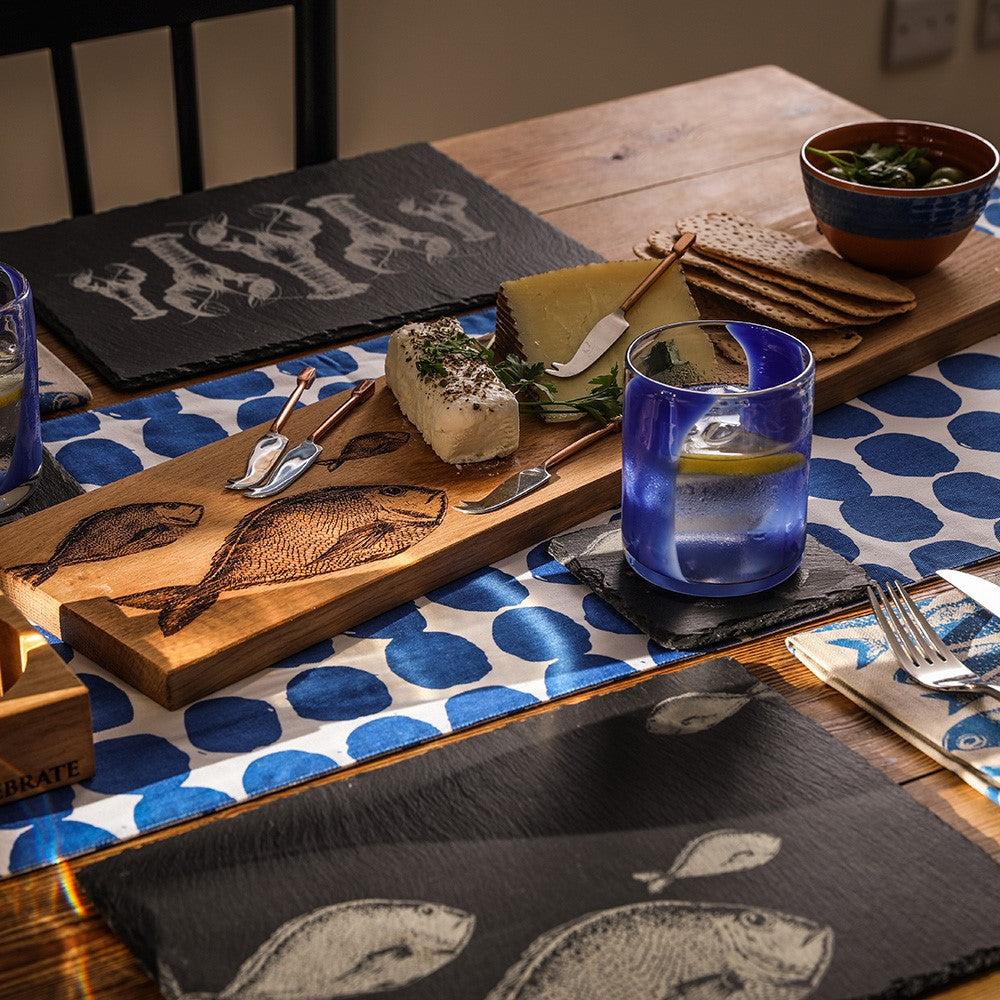 Wooden oak serving platter with engraved fish design and rustic natural finish perfect for serving and display