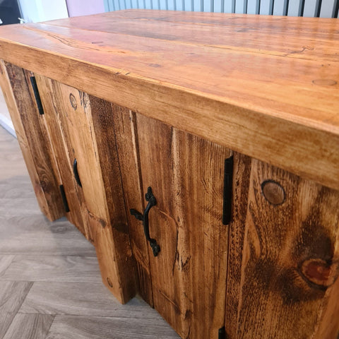 Rustic wooden fish tank stand with warm natural finish and black metal handles for redwood aquarium storage unit