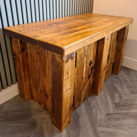 Rustic wooden fish tank stand with warm redwood finish and visible grain patterns for aquarium storage use