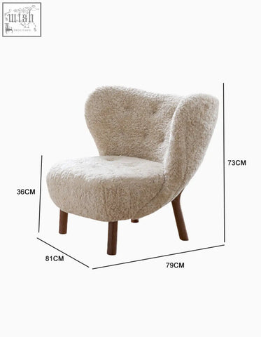 Cream-colored fitz armchair with plush artificial wool and tufted upholstery perfect as a cozy lounge chair
