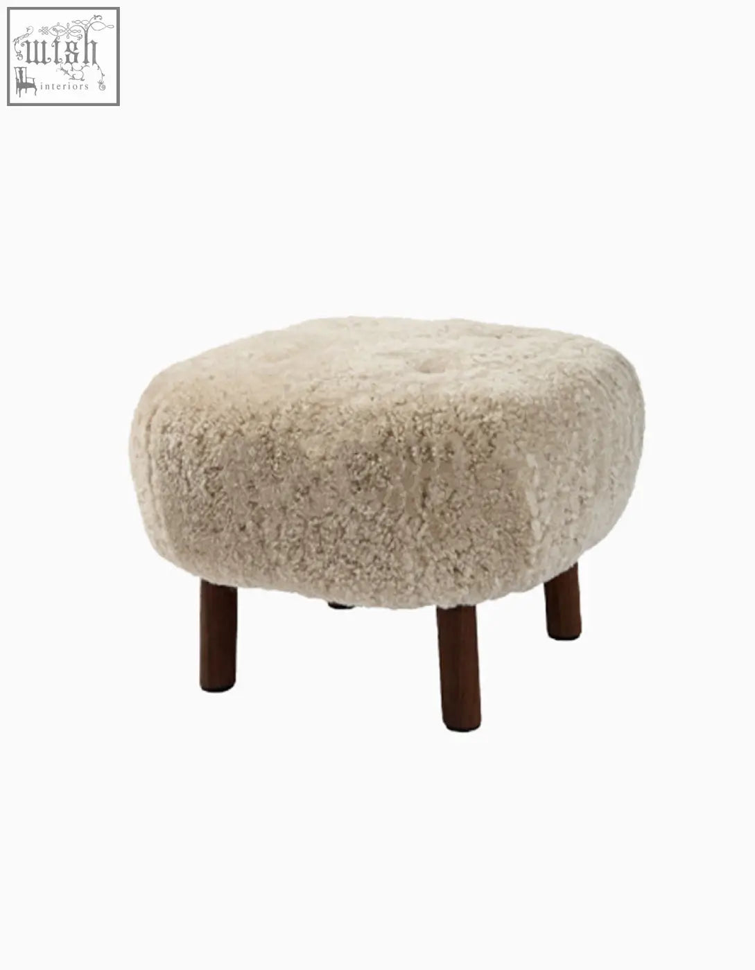 Cream-colored sheepskin ottoman with dark wood legs for fitz armchair lounge chair made with artificial wool