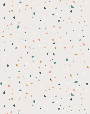 Flake terrazzo surface with light beige base and speckled teal coral pink mustard yellow dark gray and white fragments