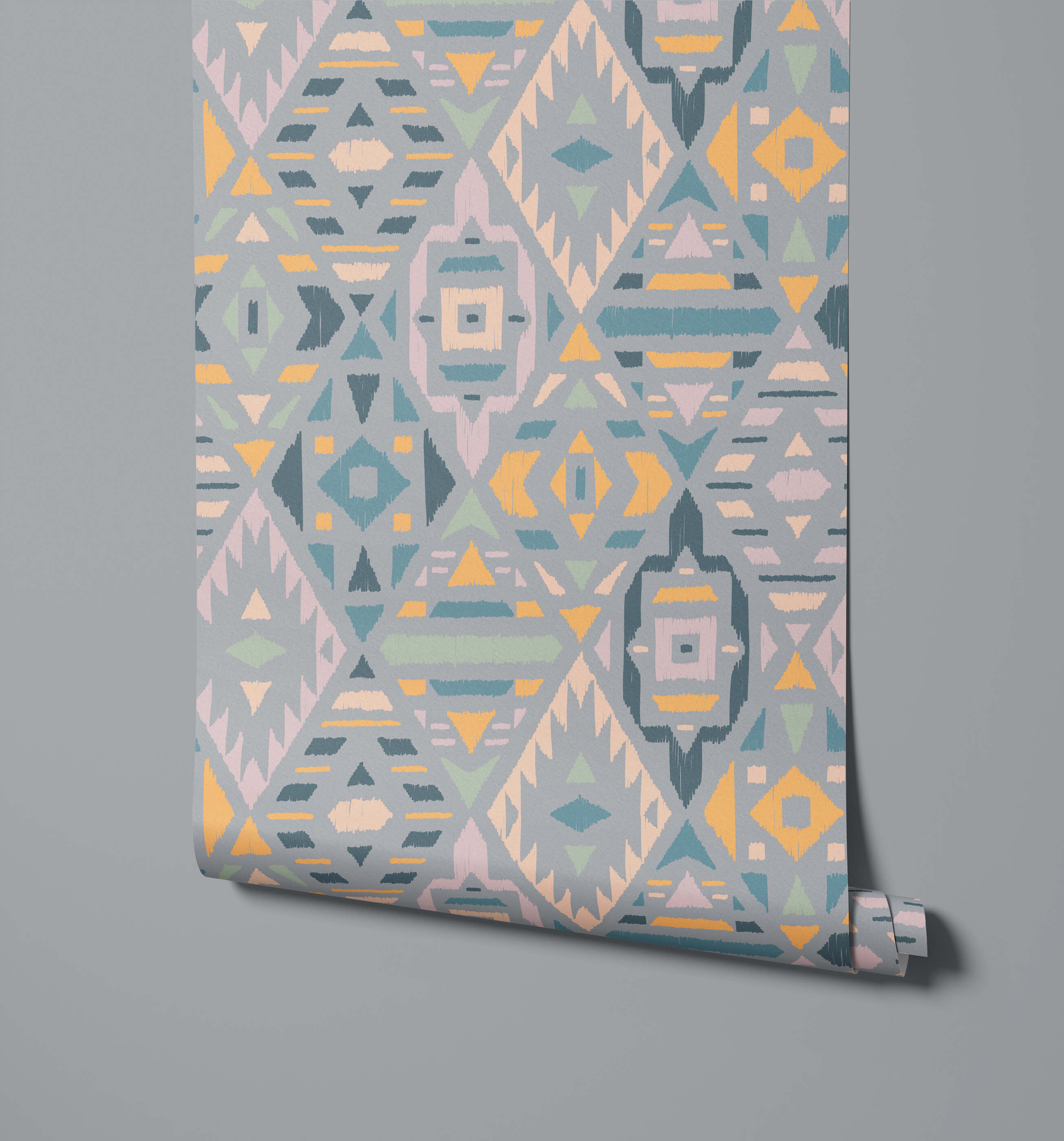 Fleece fabric with geometric pattern in muted gray teal yellow and beige tones featuring a textured brushstroke finish
