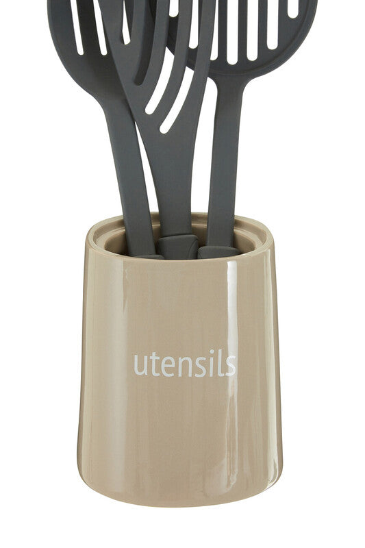 Beige ceramic utensil holder with utensils printed in white perfect for kitchen organization and storage