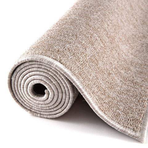 Beige low pile carpet roll with soft plush pile and neatly finished edges flex beige low solid rug