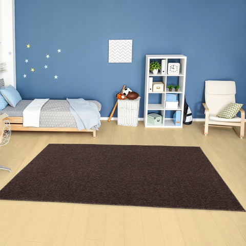 Brown low pile rectangular rug with a textured plush surface from the flex brown low pile collection