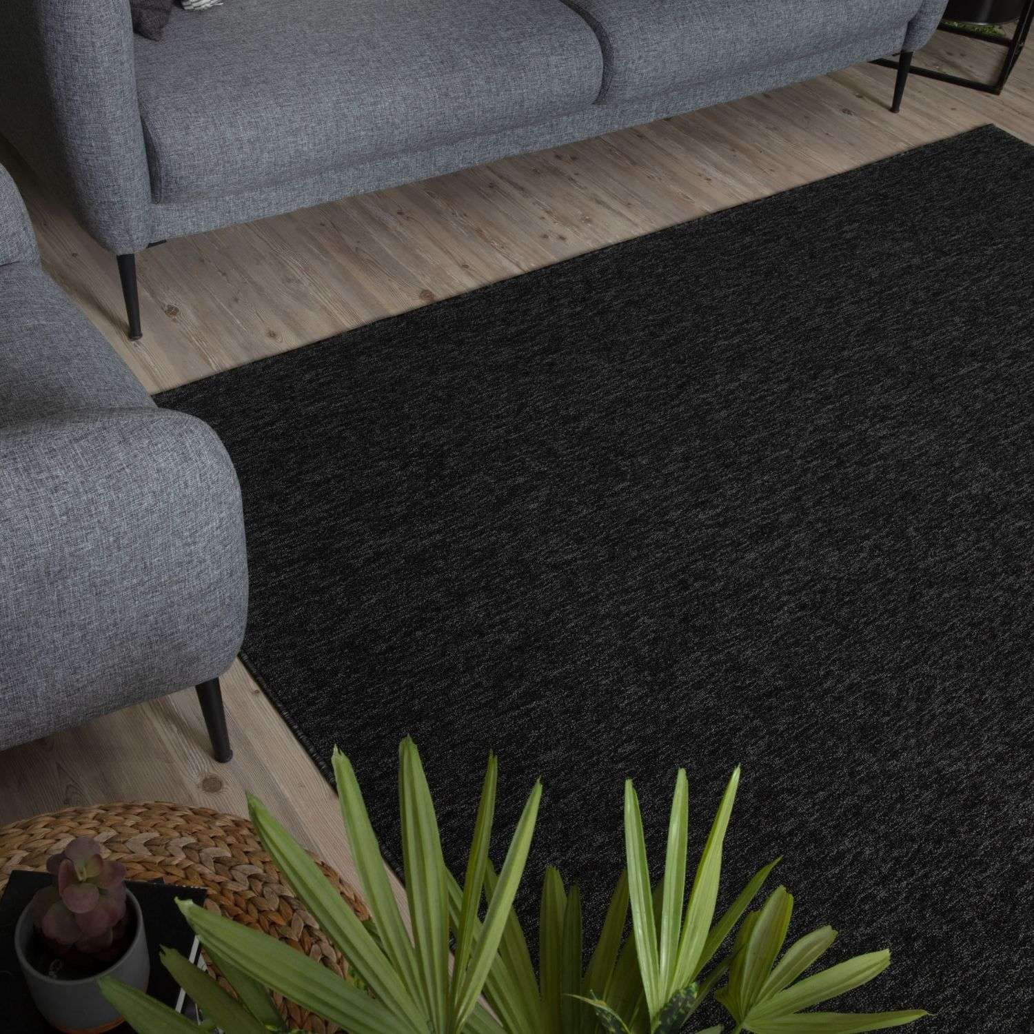 Black textured area rug in flex dark grey low pile solid design perfect for modern living spaces