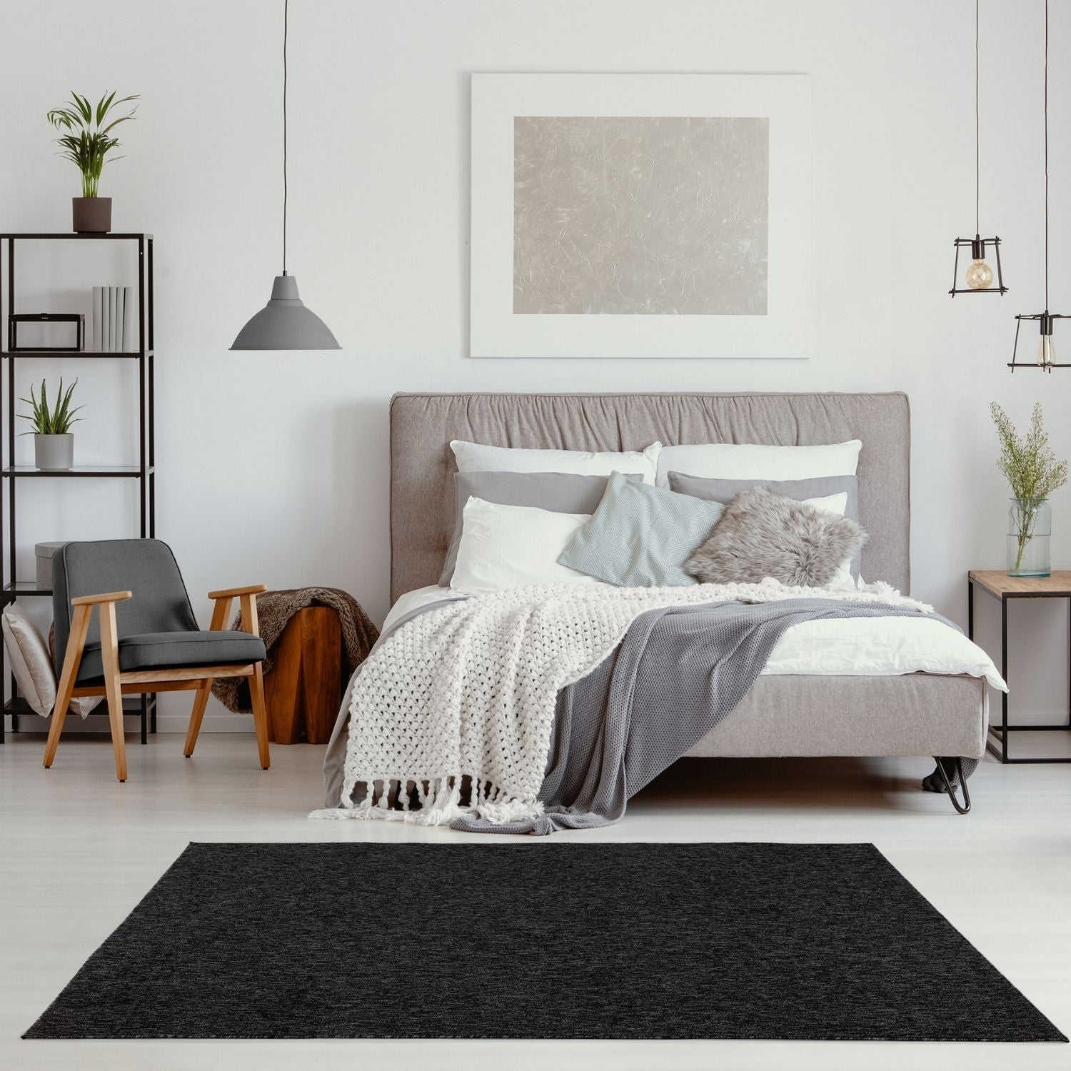 Black textured low pile area rug in flex dark grey perfect for modern living spaces