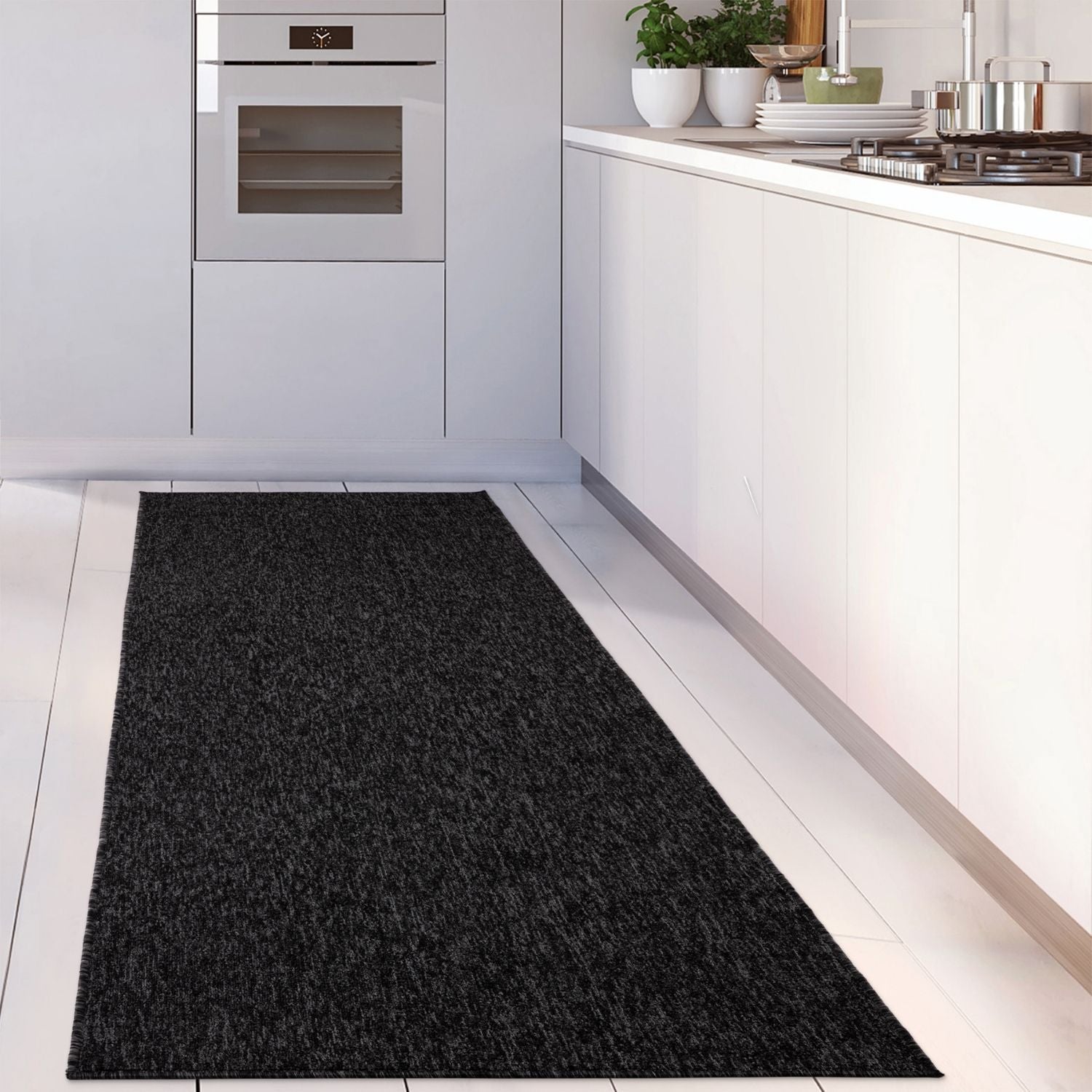 Black textured flex dark grey low pile solid area rug for modern living spaces and cozy floors