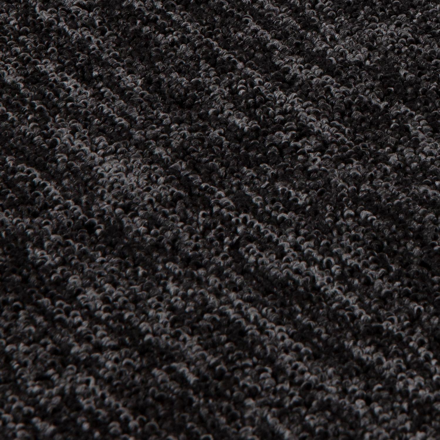 Black textured flex dark grey low pile solid rug with dense plush pile perfect for cozy indoor spaces