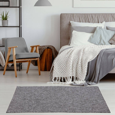Gray low pile area rug with subtle heathered texture and frayed edges flex grey low pile design