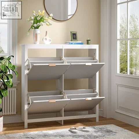 White wood shoe cabinet with four pull-out drawers and rose gold handles stores up to sixteen pairs