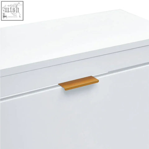 Gold-toned rectangular drawer pull on white flip down wood shoe cabinet with 4 shelves for sixteen pairs of shoes