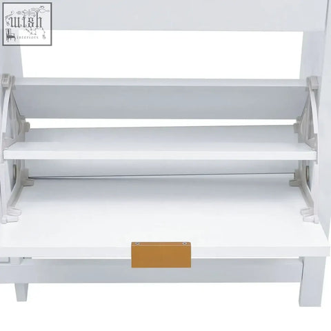 White wood shoe cabinet with four flip down shelves and gold pull handle holds up to sixteen pairs