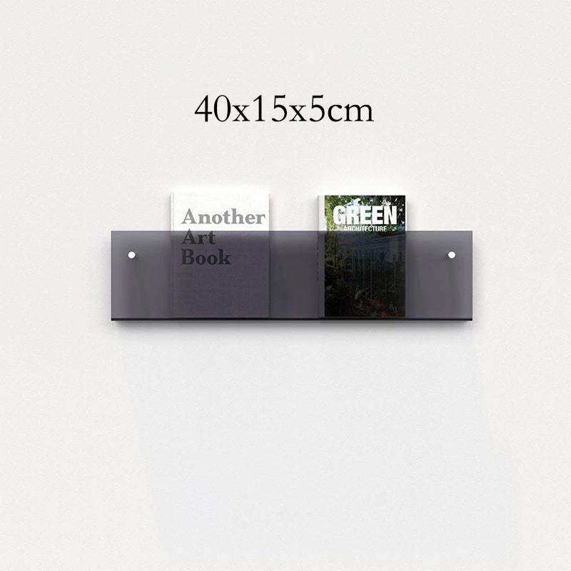 A sleek translucent dark gray floating acrylic magazine holder with two compartments for wall mounting