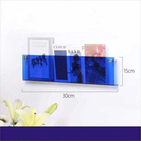 Blue translucent floating acrylic magazine holder with three compartments wall mounted for easy storage