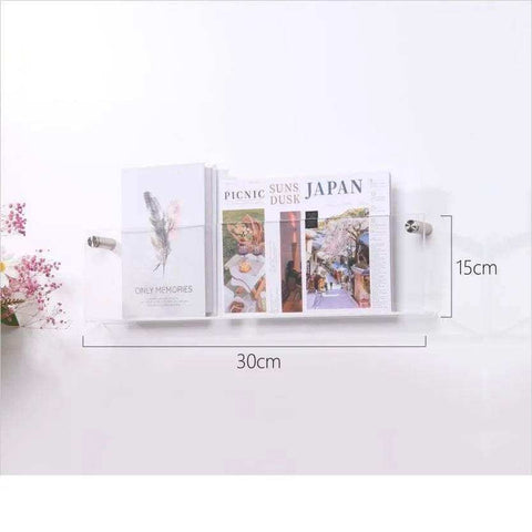 Clear floating acrylic magazine holder with silver-toned metal brackets wall-mounted acrylic magazine rack