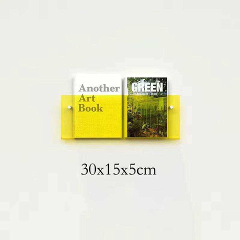 Bright yellow floating acrylic magazine holder with two slots holding different magazines made of acrylic material