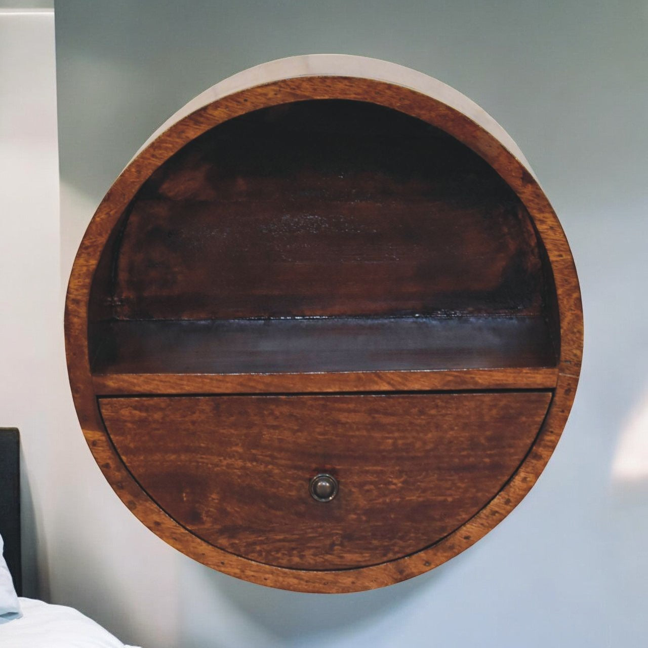 Round wooden nightstand with dark brown finish and single drawer with metal knob from floating circle chestnut bedside table