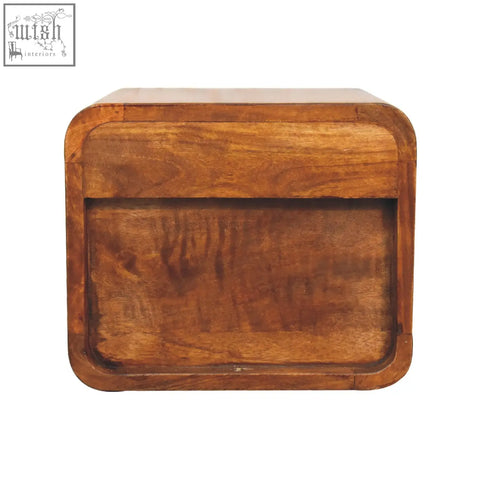 Floating mini chestnut bedside table with a warm medium-brown wood finish and natural grain wall-mounted design