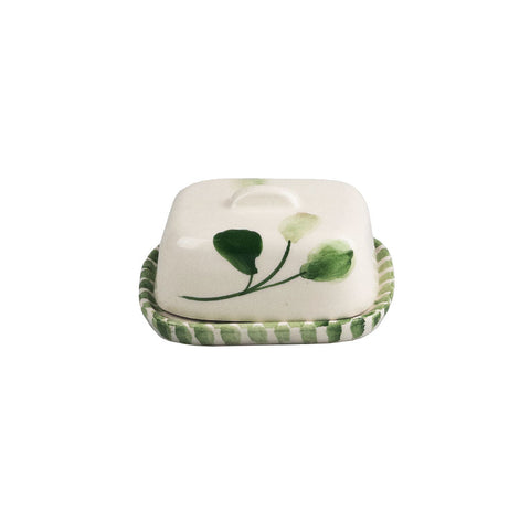 Flora mini ceramic butter dish with white ceramic, green leaf design, and matching striped base for serving butter