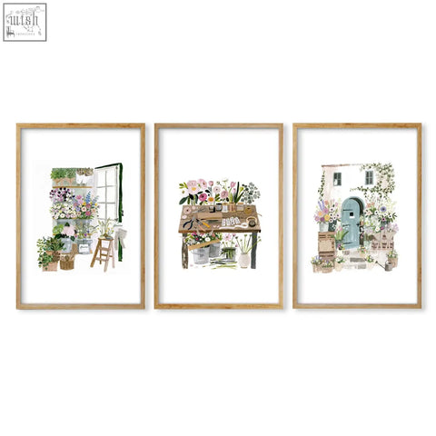 Set of three floral art illustrated prints in rustic wooden frames perfect for country cottage wall decor