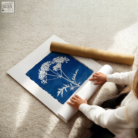 A framed floral art wall cyanotype print with white botanical design on deep indigo paper set of 3 wildflower prints