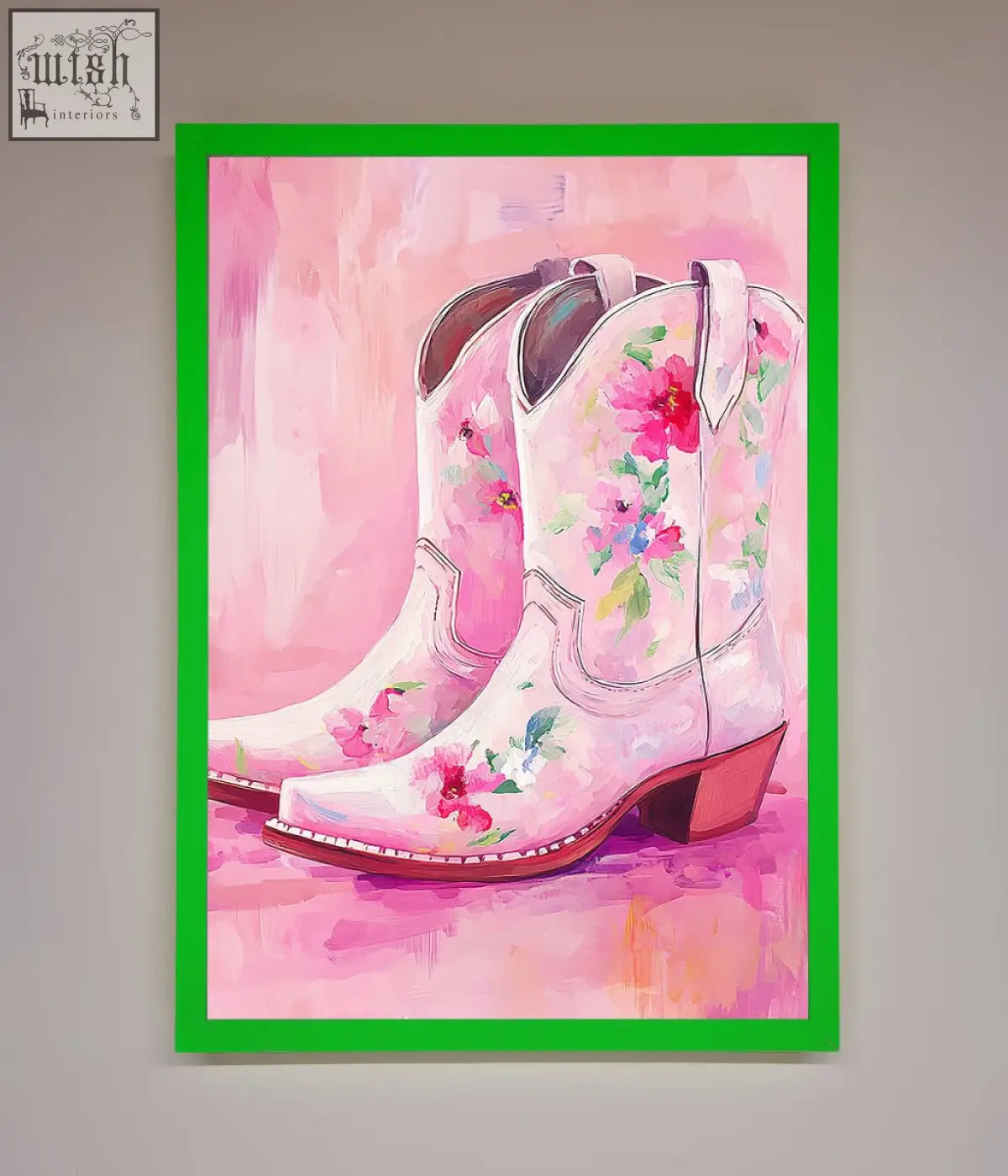 A vibrant pink floral cowboy boots framed poster featuring delicate blossoms and a bold green frame