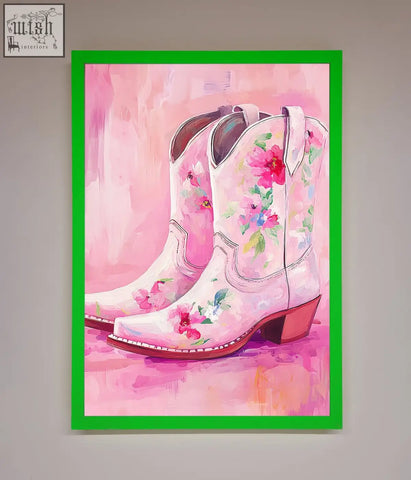 A vibrant pink floral cowboy boots framed poster featuring delicate blossoms and a bold green frame