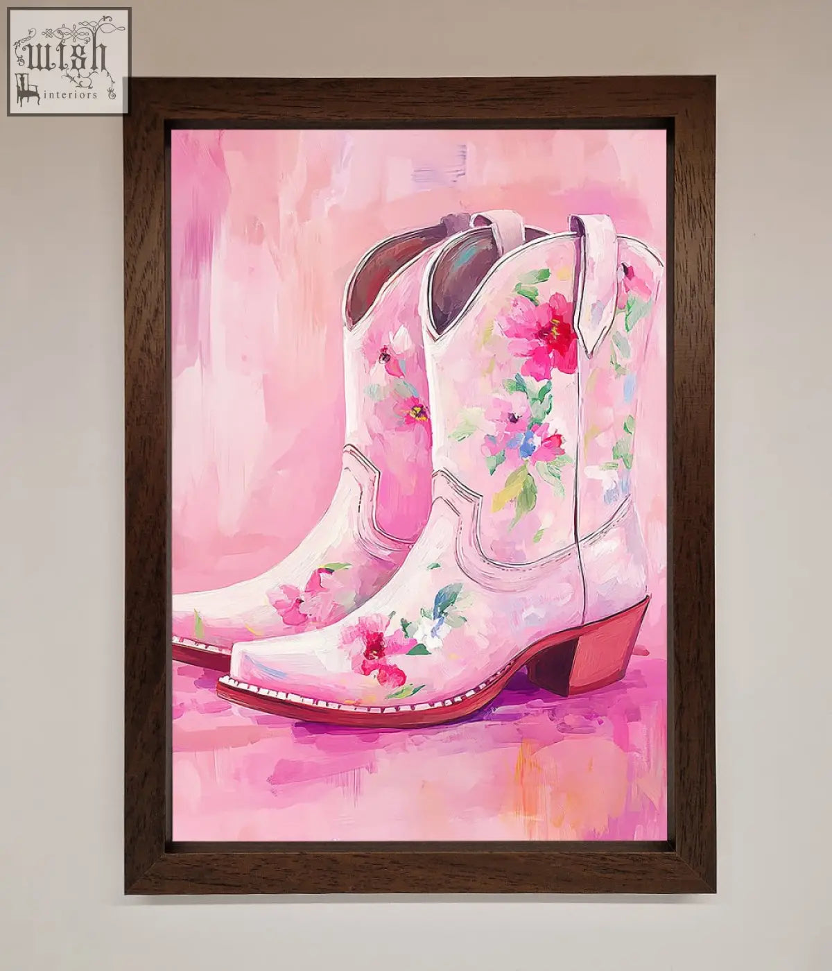 A pair of pink floral cowboy boots with red and blue blossoms in a soft watercolor style on a boots framed poster