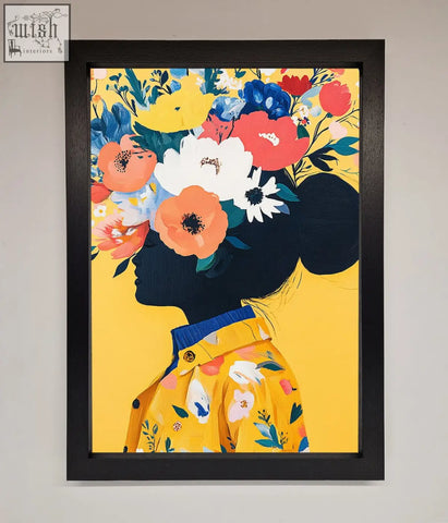 A floral explosion yellow framed print featuring a vibrant silhouette in yellow with bold reds oranges and blues background