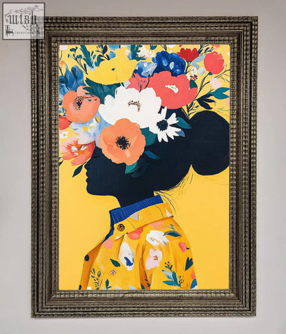 A vibrant floral explosion yellow framed print featuring a woman silhouette with orange red blossoms in a silver frame